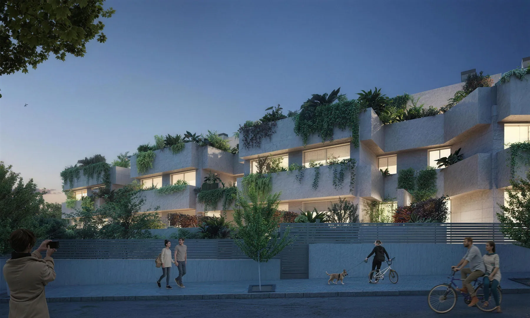 Viviendas unifamiliares Nature Homes en Valdebebas al anochecer